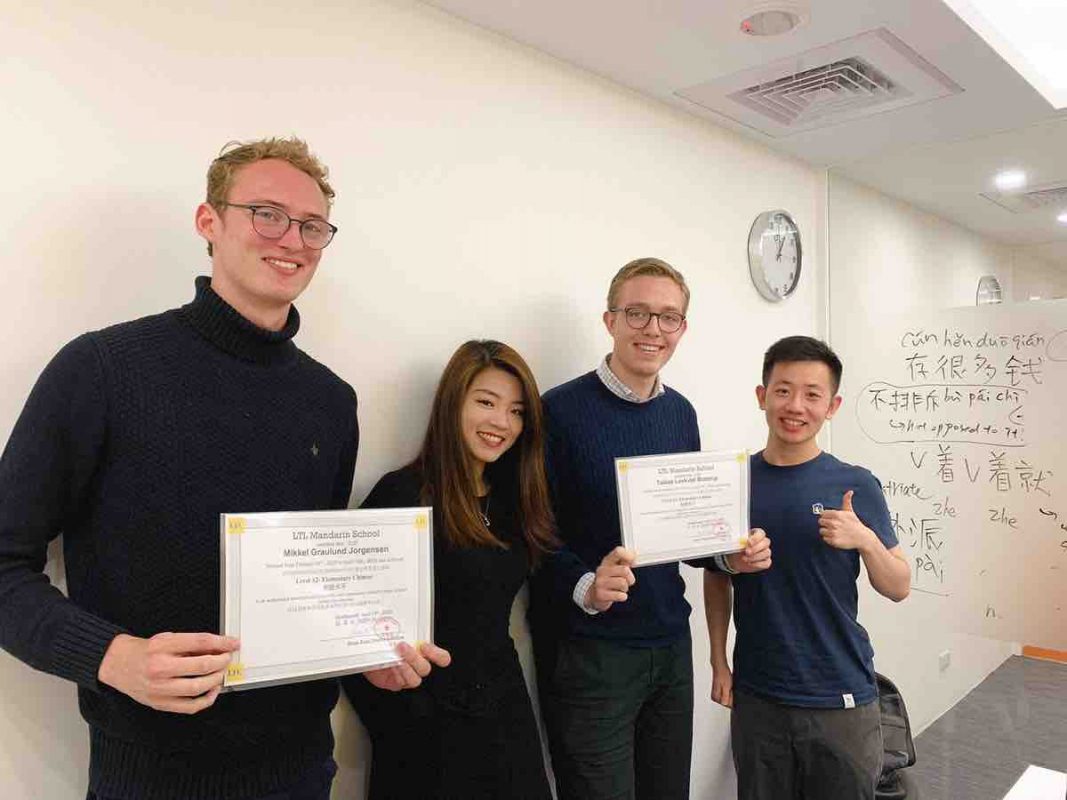 Tobias and Mikkel with their teachers