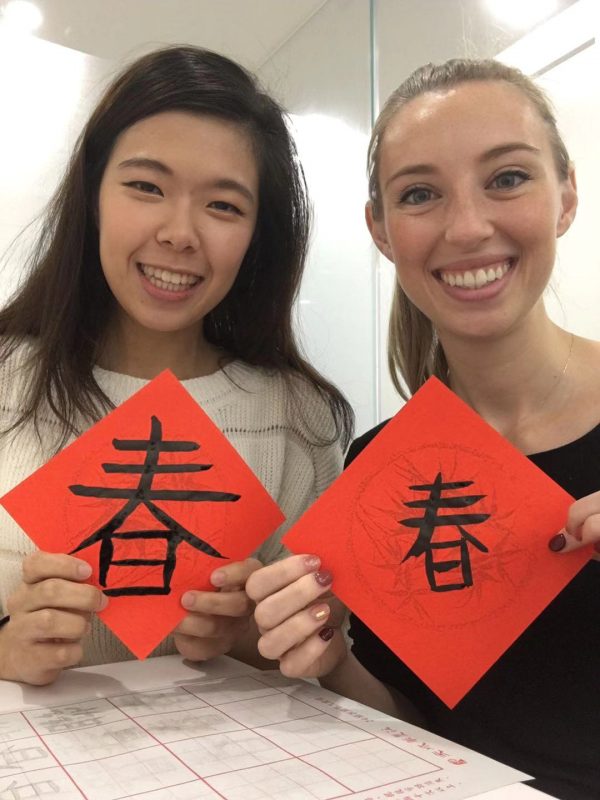 Ehana with her student practicing Chinese